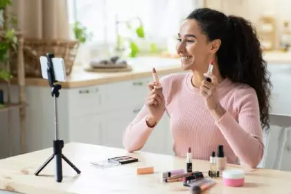 Makeup Trends. Smiling Attractive Female Recording Video Content For Her Beauty Blog